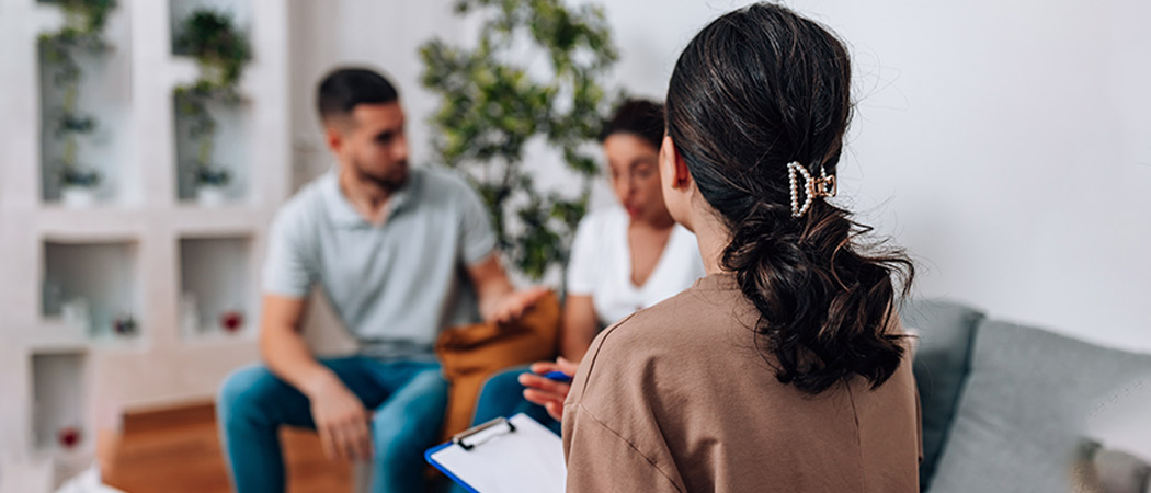Marriage counselor in Delhi guiding a couple during therapy session